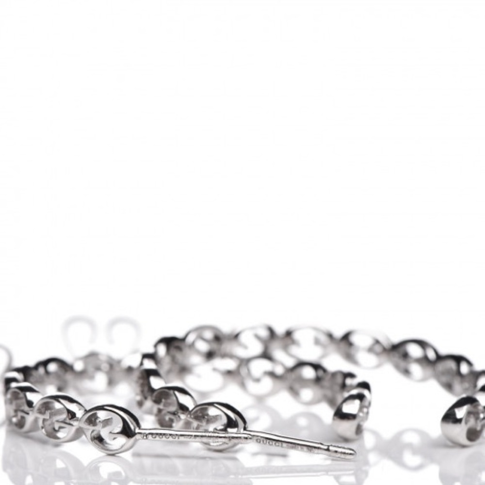 GUCCI
18K White Gold Interlocking GG Hoop Earrings - Picture 2 of 3